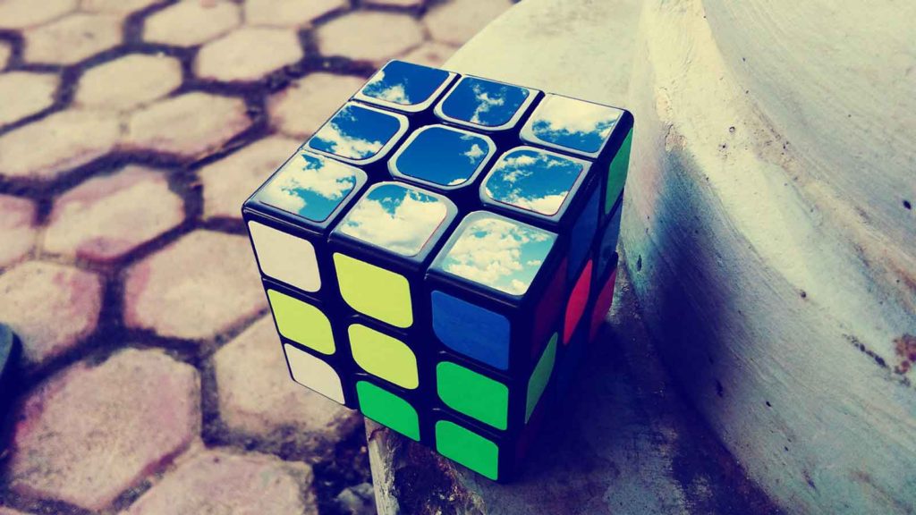 Rubik's Cube with sky and clouds